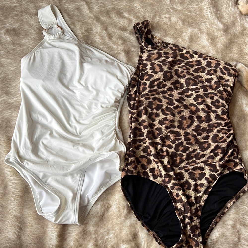 Set of Micheal Kors one piece suits.